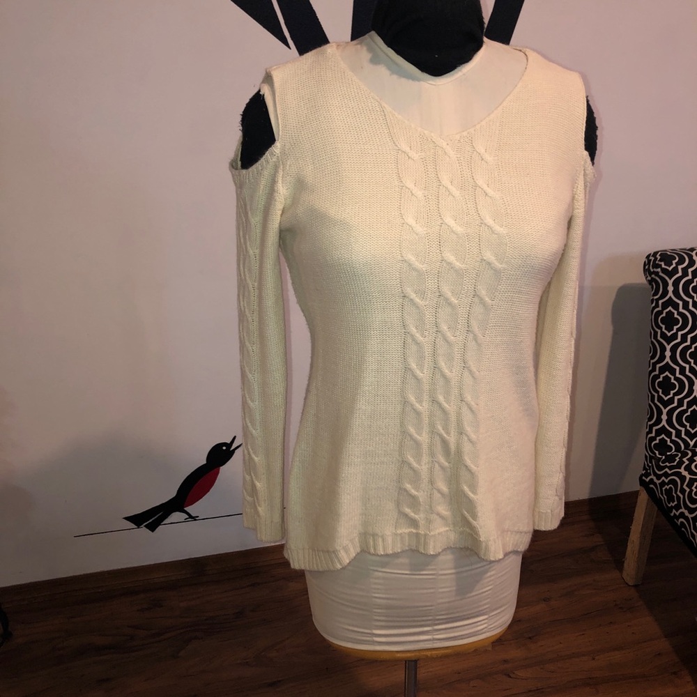 Cream, Lomantise size small, cold shoulder knit sweater. Asymmetrical hem